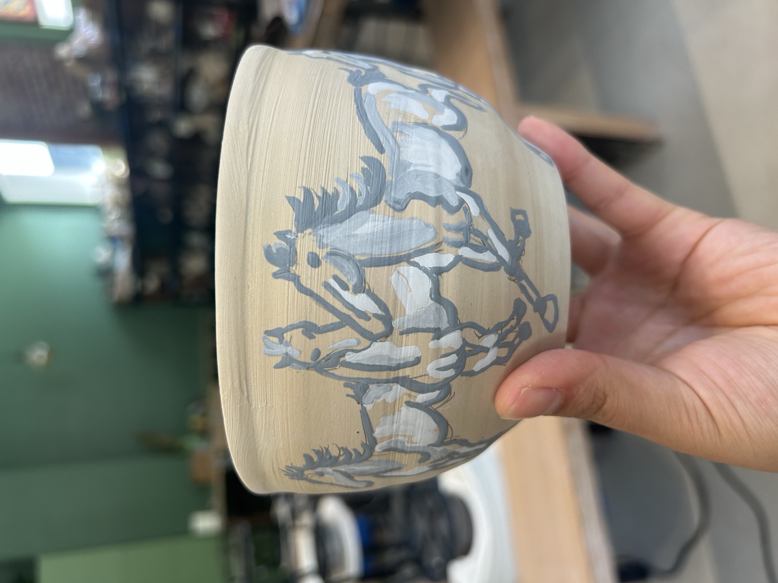 Unglazed bowl, hand-painted horses